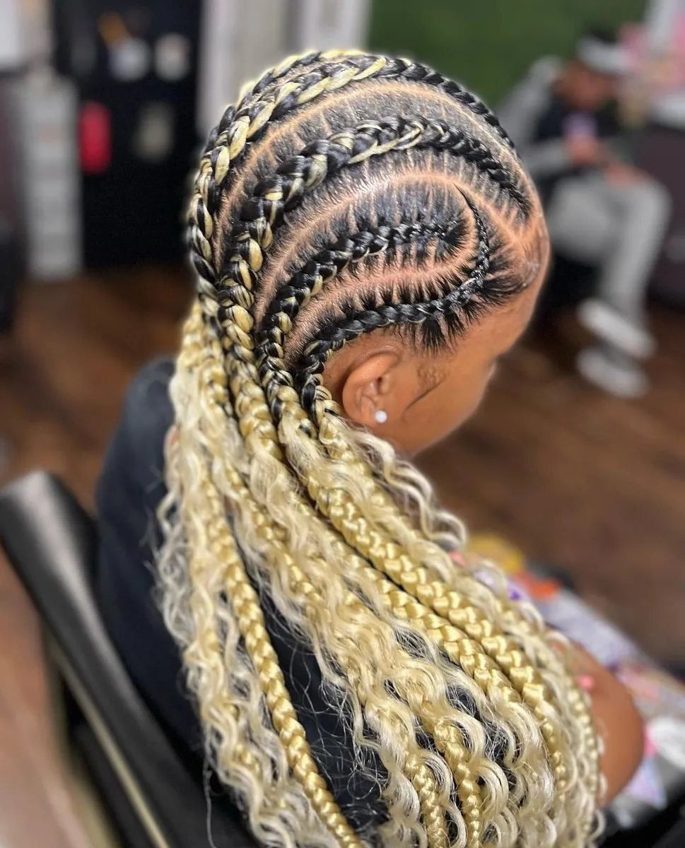 14. The Side-Swept Cornrow Updo