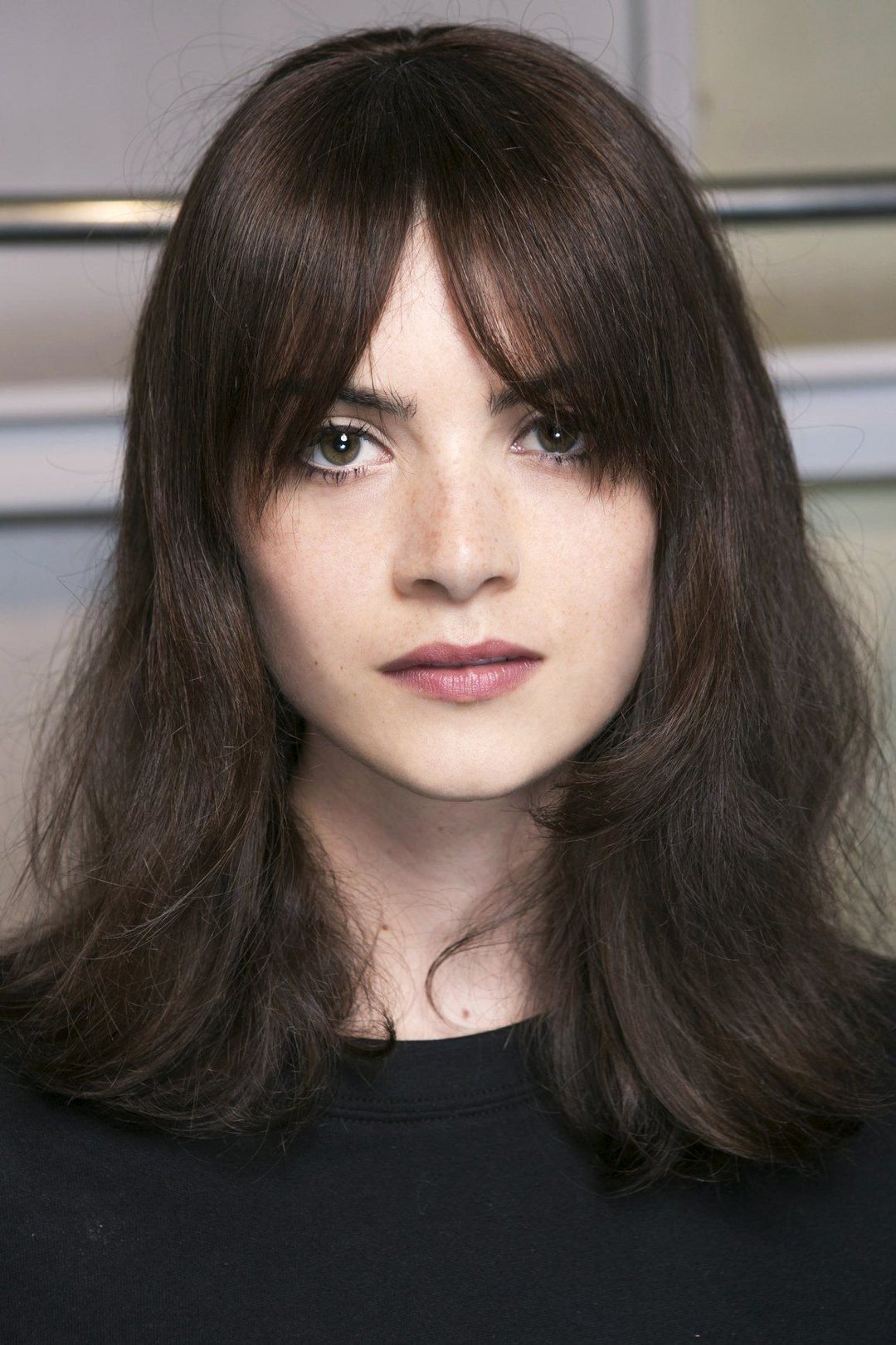 7. Long Curtain Bangs